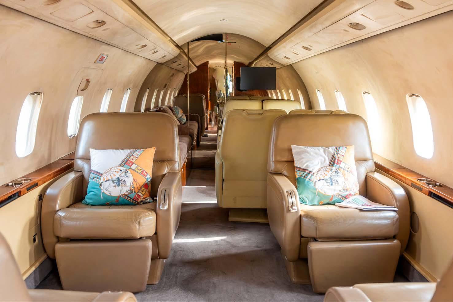 Challenger 601-3A cabin with tan leather seating